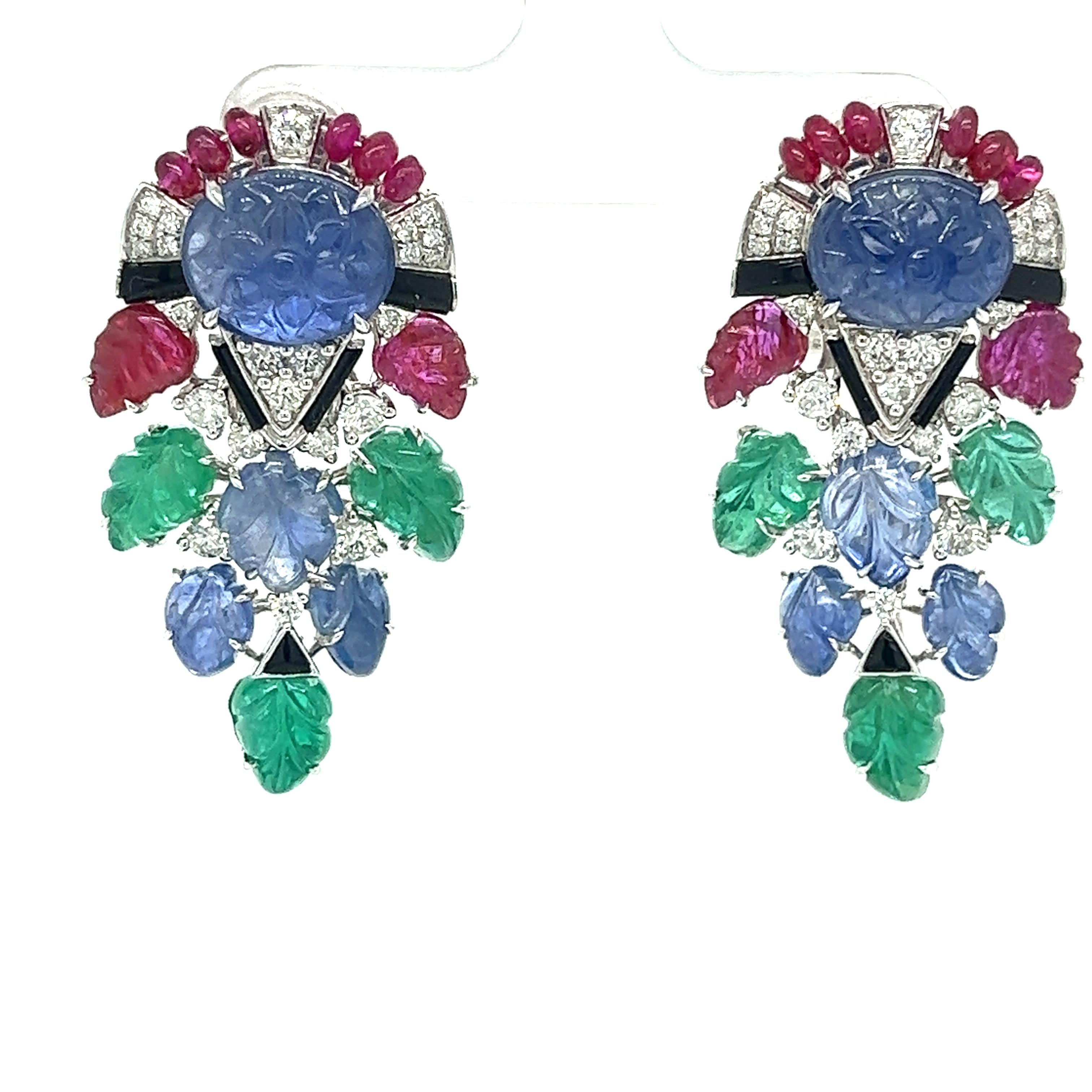 18K Gold Burma Ruby & Sapphire & Sapphire Earrings with Diamonds

Main Stone Unheated Burma Sapphires - 11. 57 CT
Unheated Burma Rubies & Sapphires & Emeralds - Total 15.345 CT
Diamonds - 1.368 CT
18K Gold
Total Weight - 24.2 GM

Indulge in the