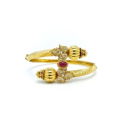 18k Gold Bypass Bracelet with Diamonds and a Ruby from India