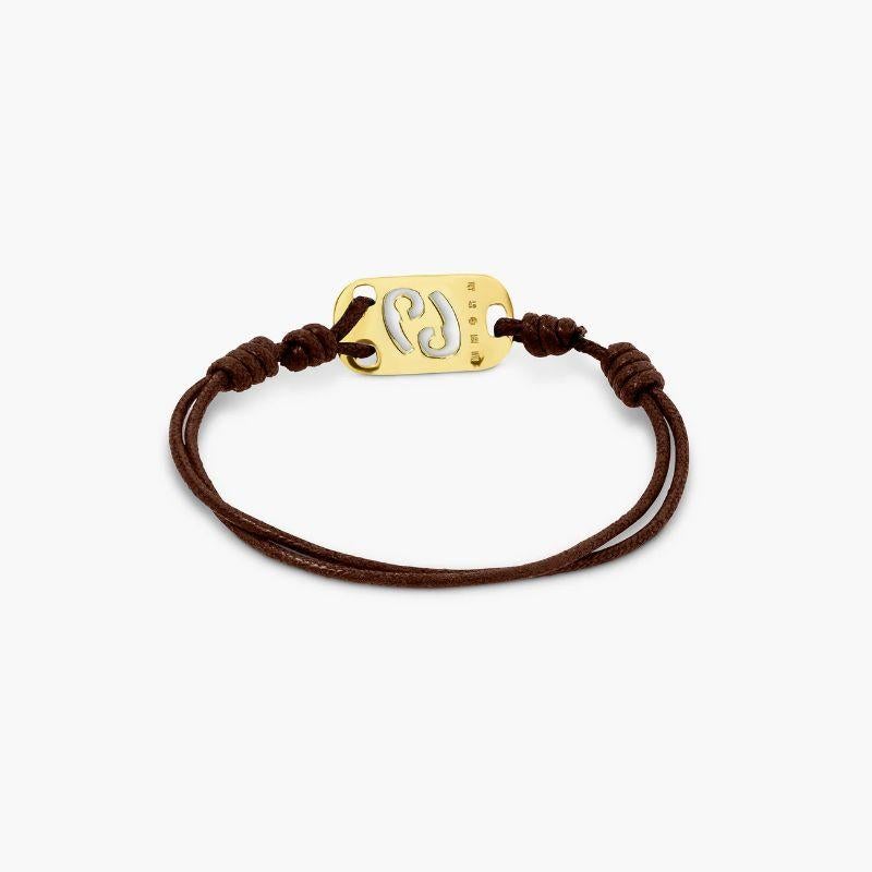 18K Gold Cancer Bracelet with Brown Cord

Celebrate the Cancer in your life with this timeless cord bracelet featuring a gold star sign tag for a personal touch. Whether it's for yourself or a birthday gift, the effortless style can be worn for any