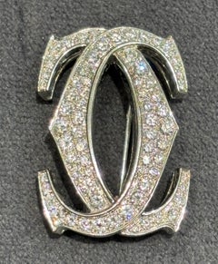 18k gold Cartier CC brooch with 2.78 carat diamonds