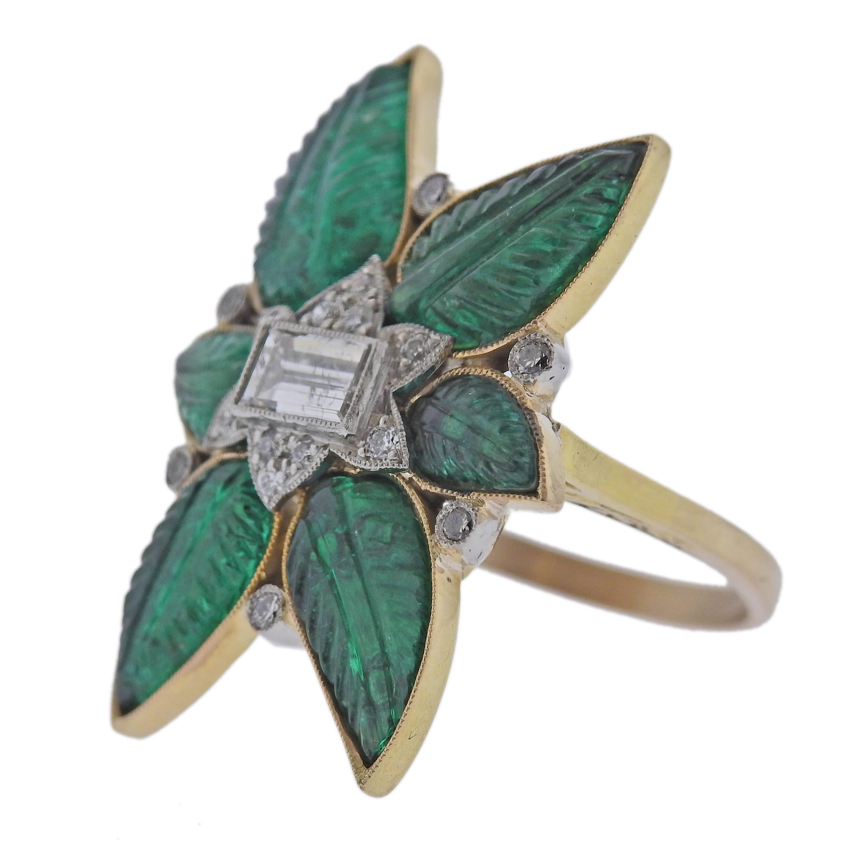 18k gold ring with carved emerald and approx. 0.55-0.60ctw diamonds. Ring size  7.75 (EU 56) and is 32 x 24mm top. Weight 12.8 grams.