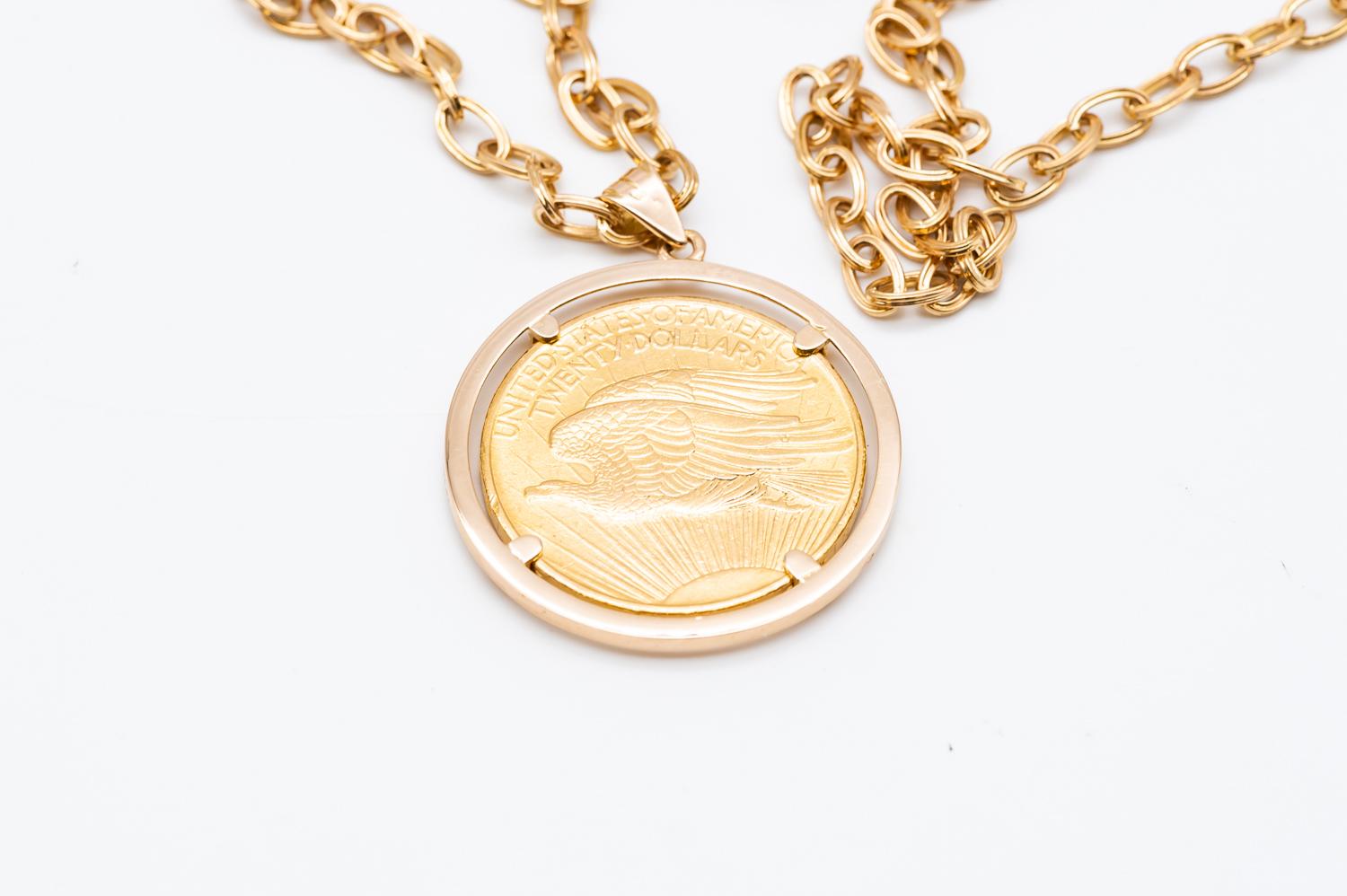 

18K Gold Chain and Piece Pendant Pure Gold Twenty American Dollars From 1908
The chain is very pretty and harmonious. It measures 80 centimeters in total. The twenty American Dollar coin is marked LIBERTY on one side with the date of 1908 and on