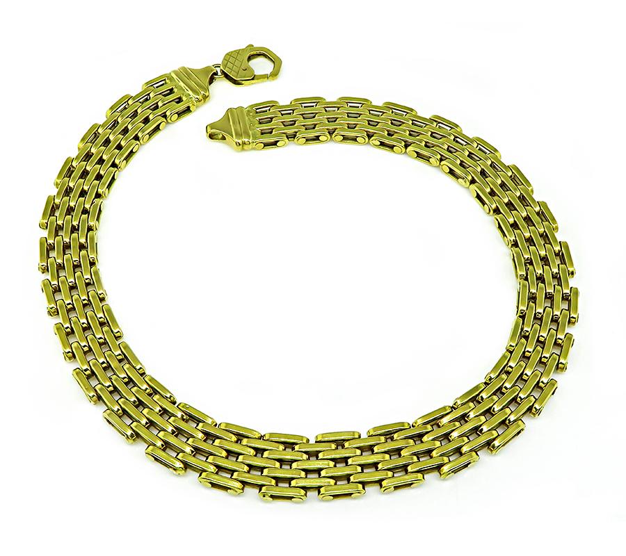 This is a charming 18k yellow gold chain link necklace. The necklace measures 18 inches in length and 16.5mm in width. The necklace is stamped 750 and weighs 76.4 grams.

Inventory #34354WKAB