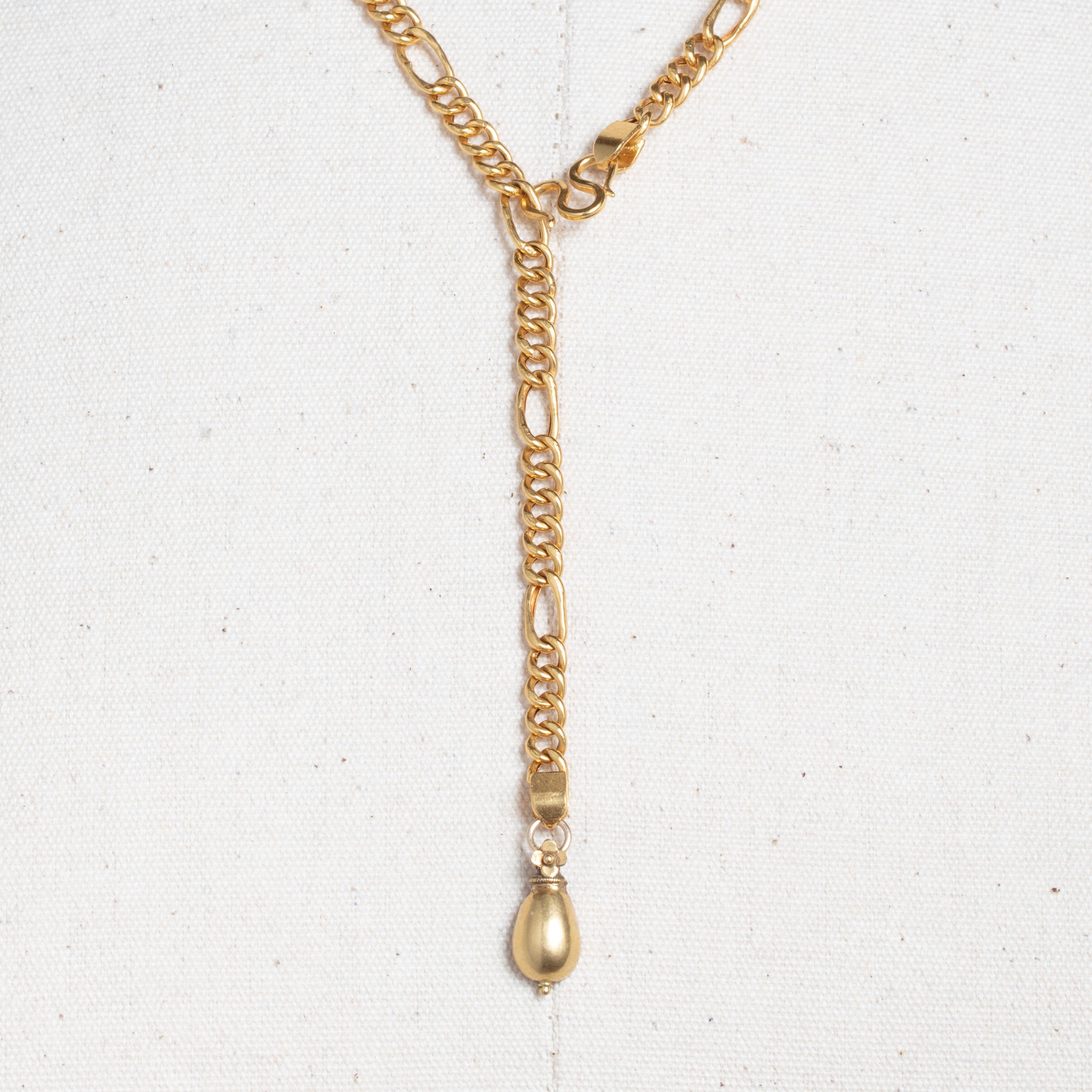 18 karat gold handmade chain with every 5 links separated by an oval link allowing for easy adjust-ability.  This can be worn as a Y necklace or as a longer 22