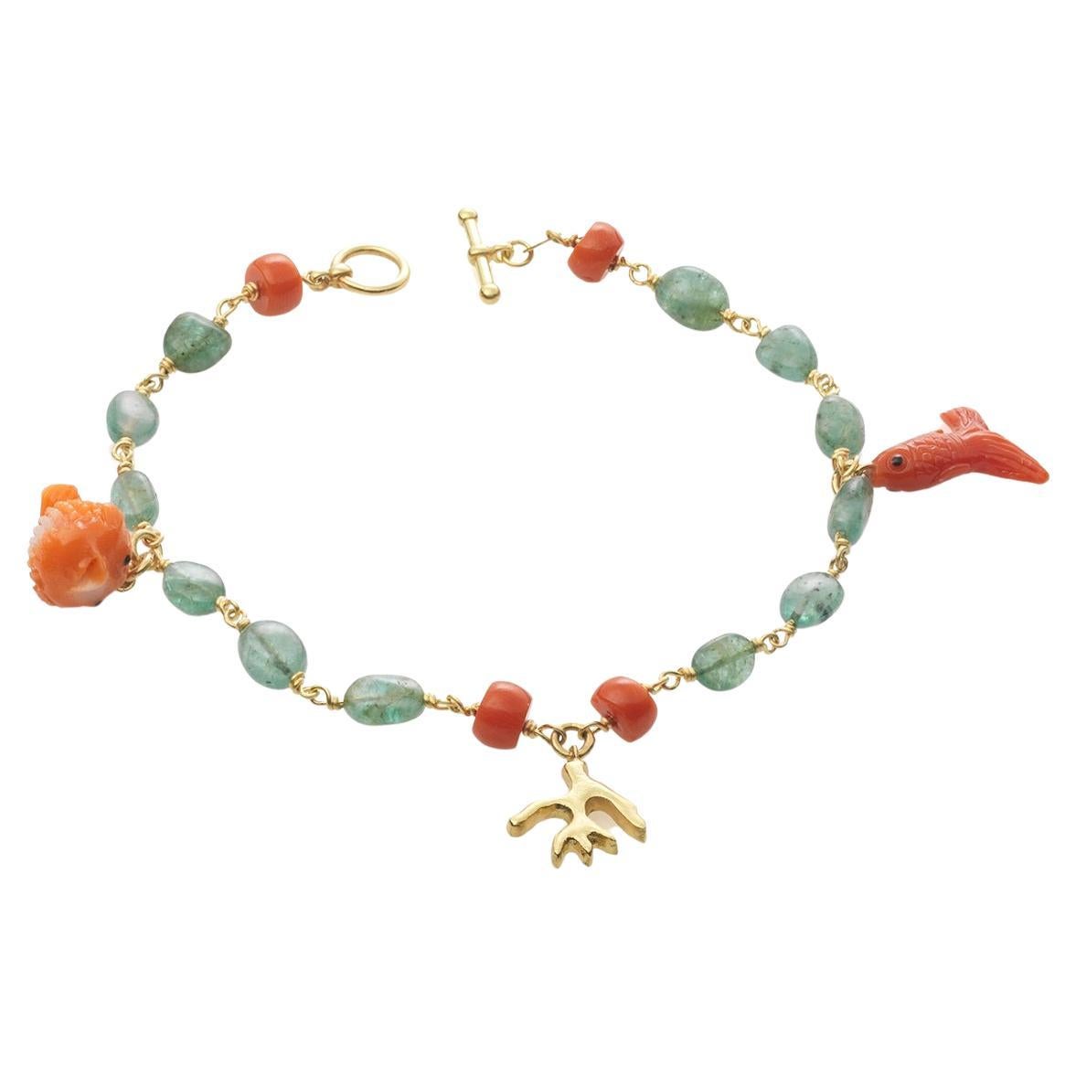 18k Gold Charm Bracelet with Coral Fish and Emerald Beads For Sale