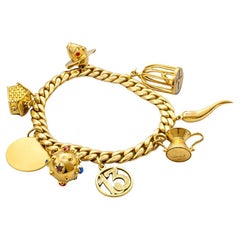 18K Gold Charm Bracelet with Lucky Symbol Charms – 42.2 Grams