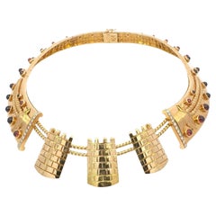 Collana girocollo in oro 18K con diamanti e granati