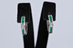 18k Gold Circa 1990s Natural Diamond And Caliber Cut Emerald Hoop Earring