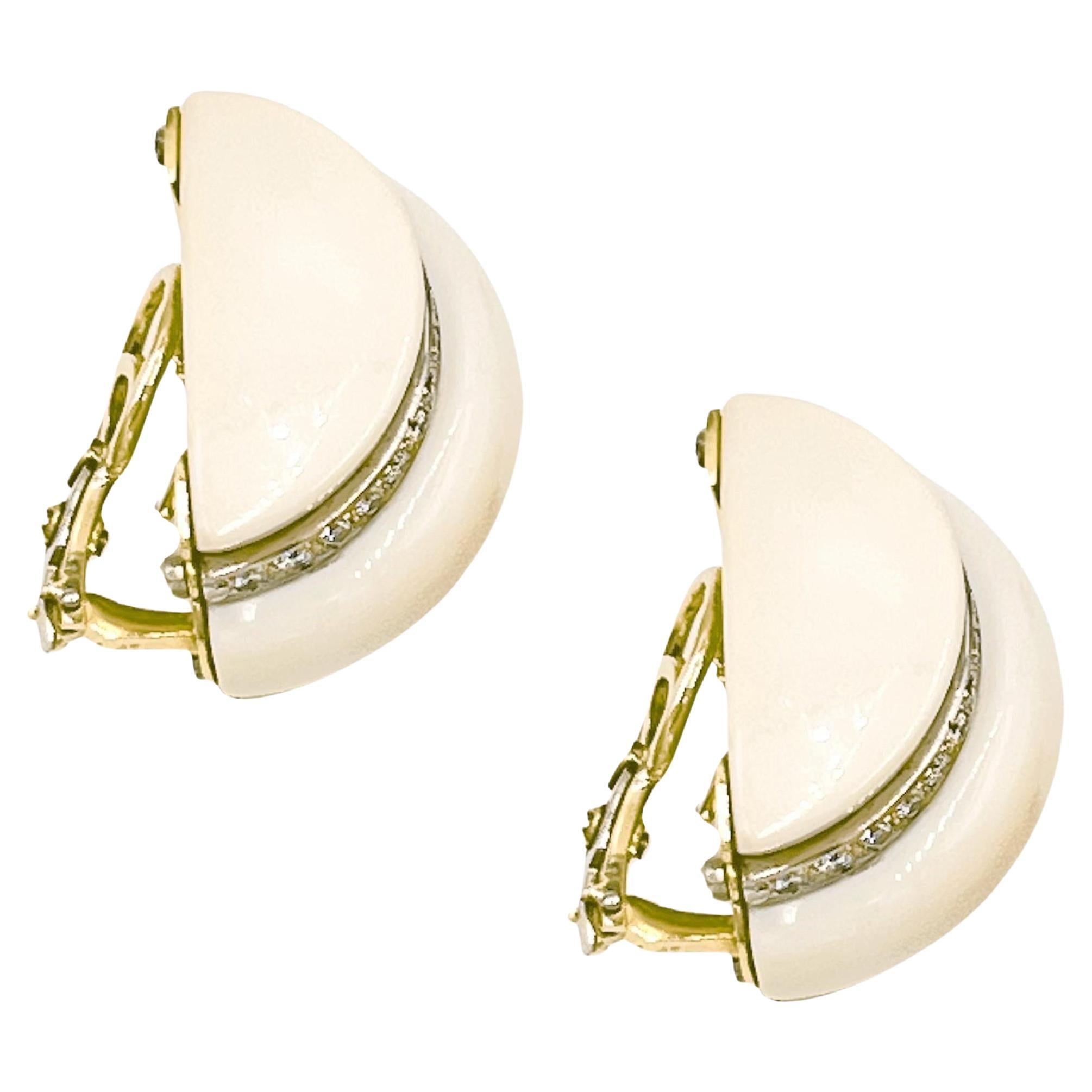 Stylish 18k yellow gold earrings set with polished cocholong in arched sections accented by round diamonds set in platinum. Clip earrings with omega style backs. Sixty-four round brilliant-cut diamonds weighing approximately 2.50 total carats. 1.37