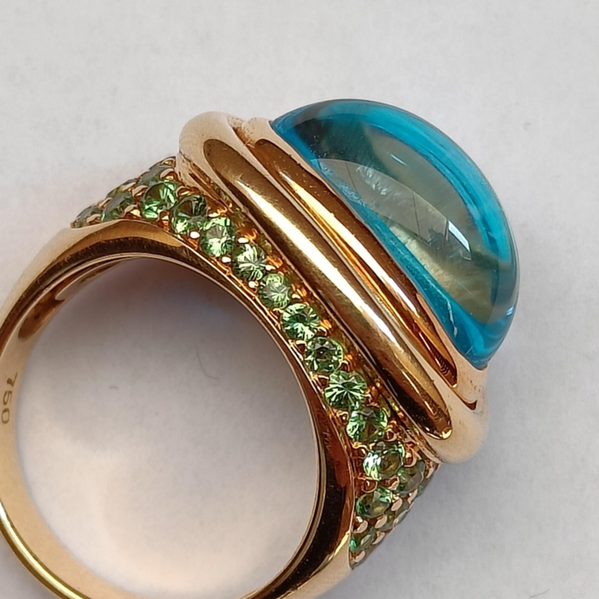 Women's or Men's 18k Gold Cocktail Ring with Blue Topaz Cabochon set with Tsavorites Pavé  For Sale