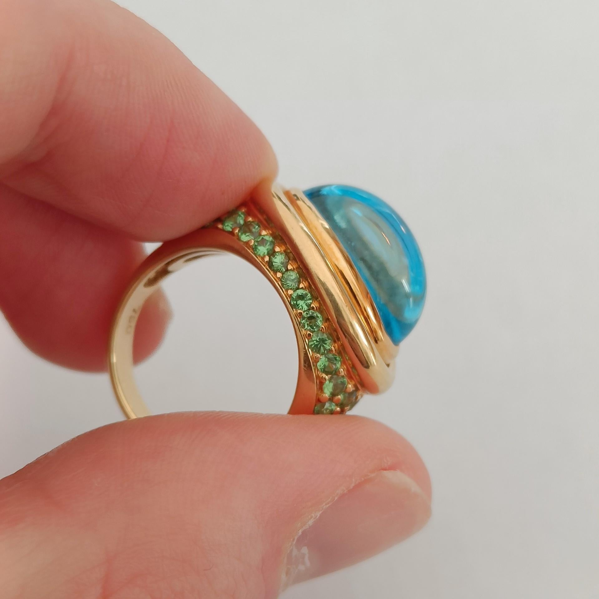 18k Gold Cocktail Ring with Blue Topaz Cabochon set with Tsavorites Pavé  For Sale 1