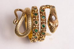 18K Gold Coil Snake Ring with Emeralds and Diamonds