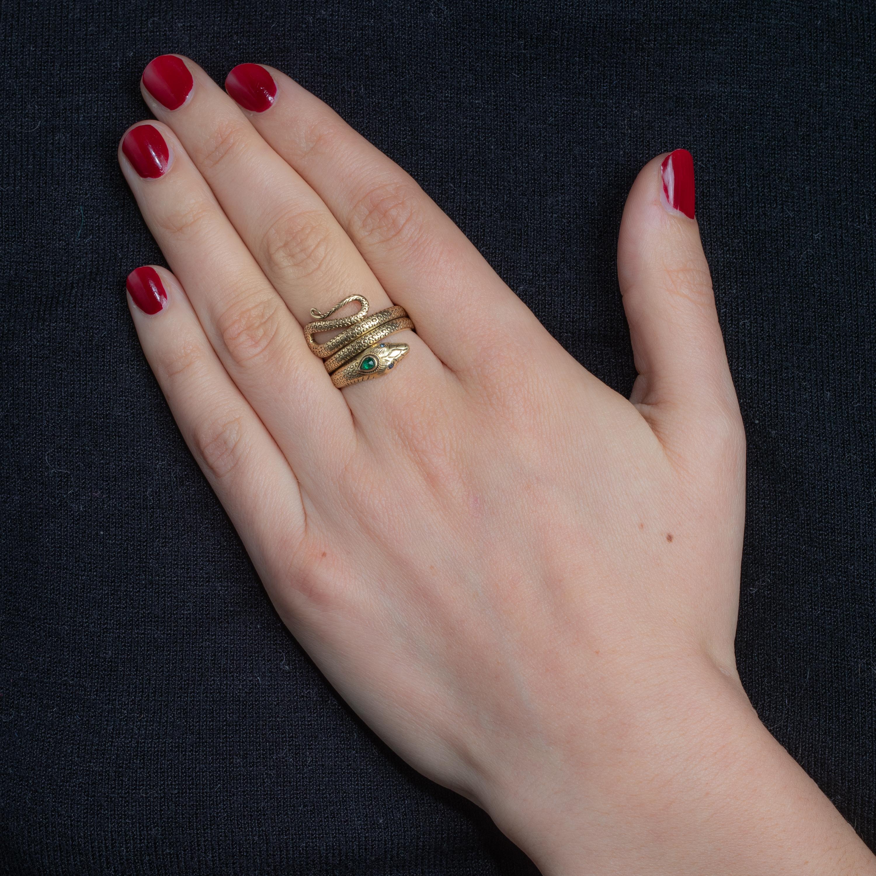 18 Karat Gold Schlangenring mit Smaragd und Saphiren 1