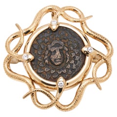 Broche/pendentif en or 18K en forme de serpent en pièces de monnaie