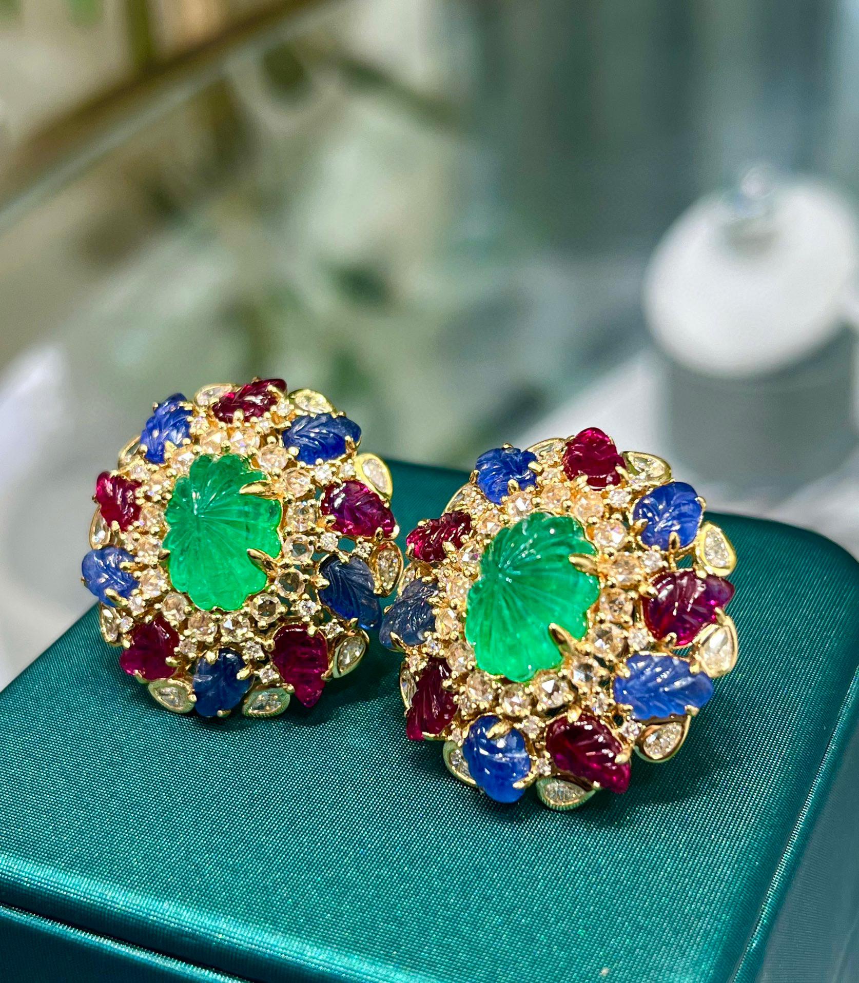 18K Gold Colombian Origin Rubies & Emeralds & Sapphires Earrings with Diamonds

Main Stone Emerald - total 8.85 CT
Colombian Rubies & Sapphires - total 10.785 CT
Diamonds - 2.347 CT
18K Gold
Total Weight - 22.56 GM

Introducing our exquisite 18K