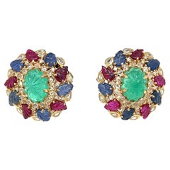 Pendientes de oro de 18 quilates con diamantes y rubíes y esmeraldas y zafiros de origen colombiano