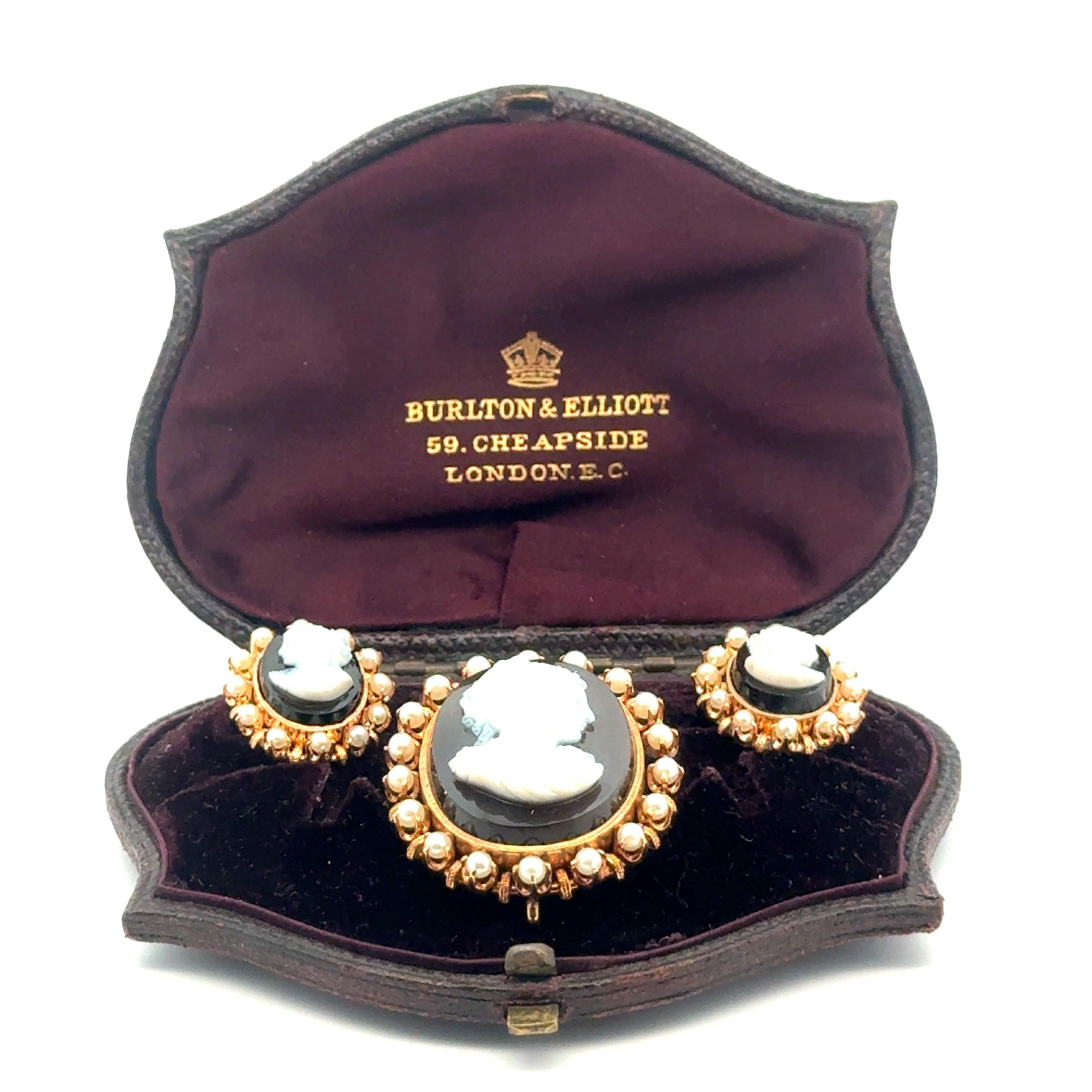 Wear a piece of art with a unique story! These 18K Gold Cultured Pearl Cameo Earrings and Brooch Suite boasts intricate craftsmanship and a unique color. Circa 1900s.  Vintage box is included but not original to the suite.

Jewelry Type :