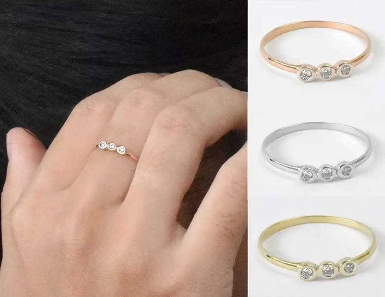 For Sale:  18k Gold Diamond 1.75 mm Ring Bezel Setting Three Diamond Ring Trio Diamond Ring 5
