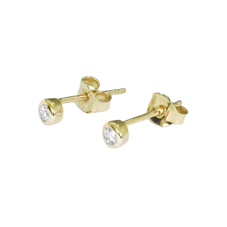 Diamond Stud Earrings in 18k Rose Gold, Yellow Gold, White Gold.

These Dainty Stud Earrings are made of 18k solid gold featuring shiny brilliant round cut natural diamonds set by master setter in our studio. Simple but unique, elegant and easy to