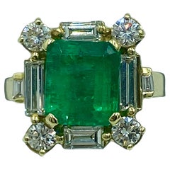 18k gold, diamond and 3.25 carat Colombian emerald ring