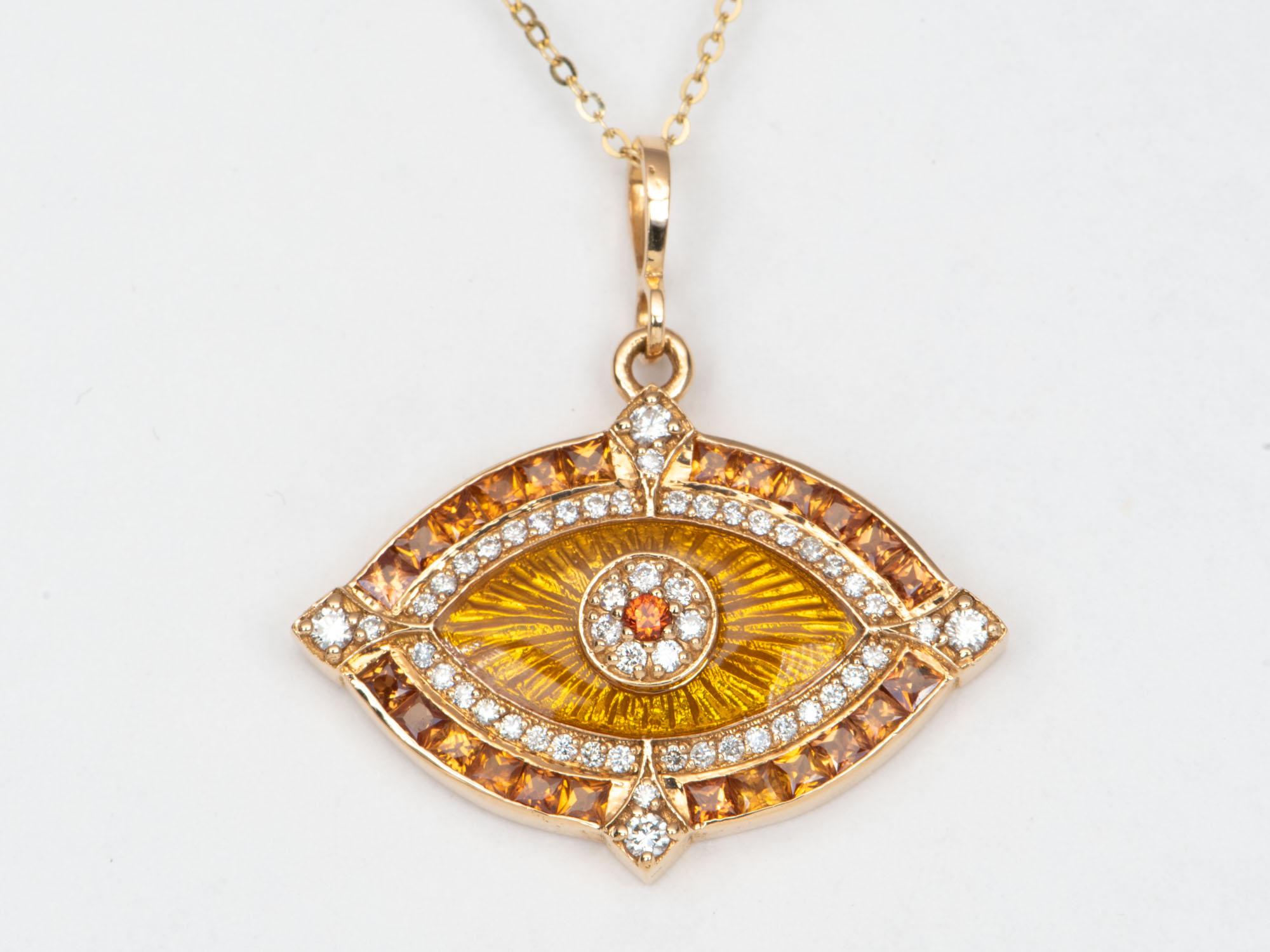 ♥ A solid 18K gold evil eye pendant featuring gorgeous princess-cut orange sapphires and diamonds
♥ This pendant features an inner halo of guilloche enamel
♥ The pendant is hung from a special chain necklace made up from the most unique long