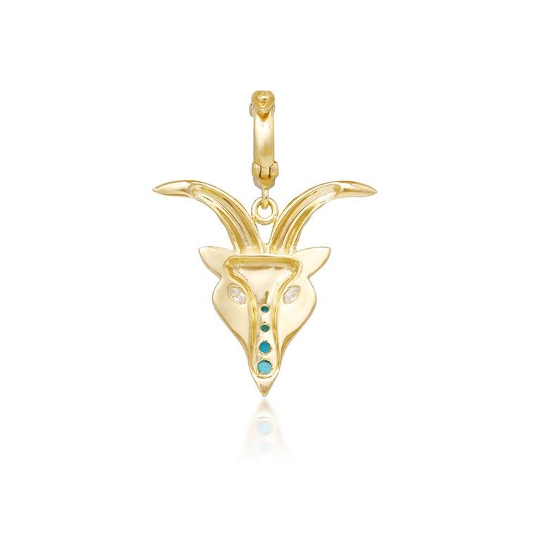 A fun twist on the traditional zodiacs. The Capricorn zodiac pendant is crafted in 18k gold and white enamel, embellished with white diamonds and Turquoise.
The diamond encrusted bezel opens to allow you to securely hook it to any of your chains. 

