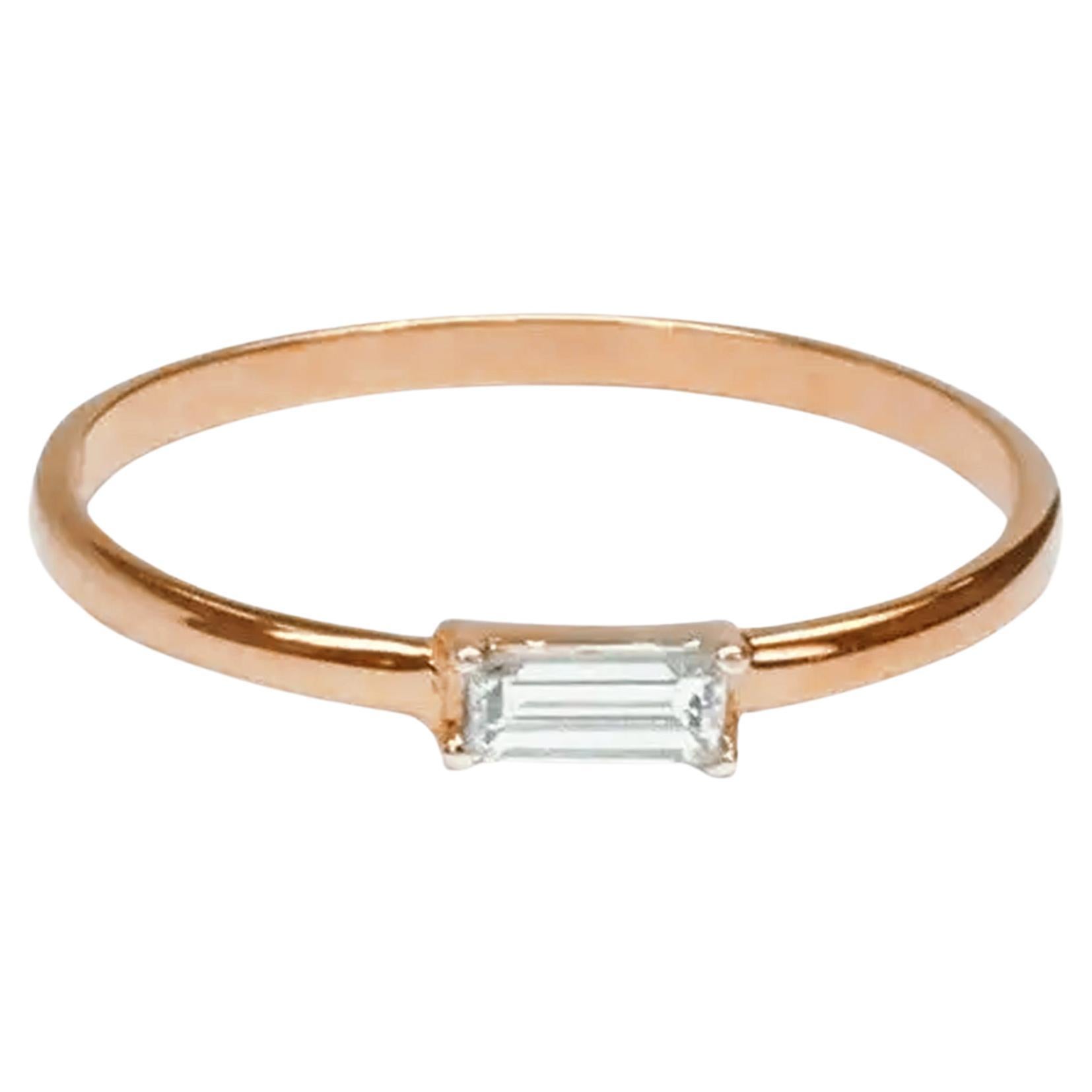 Verlobungsring aus 18 Karat Gold mit Diamanten im Baguette-Diamant