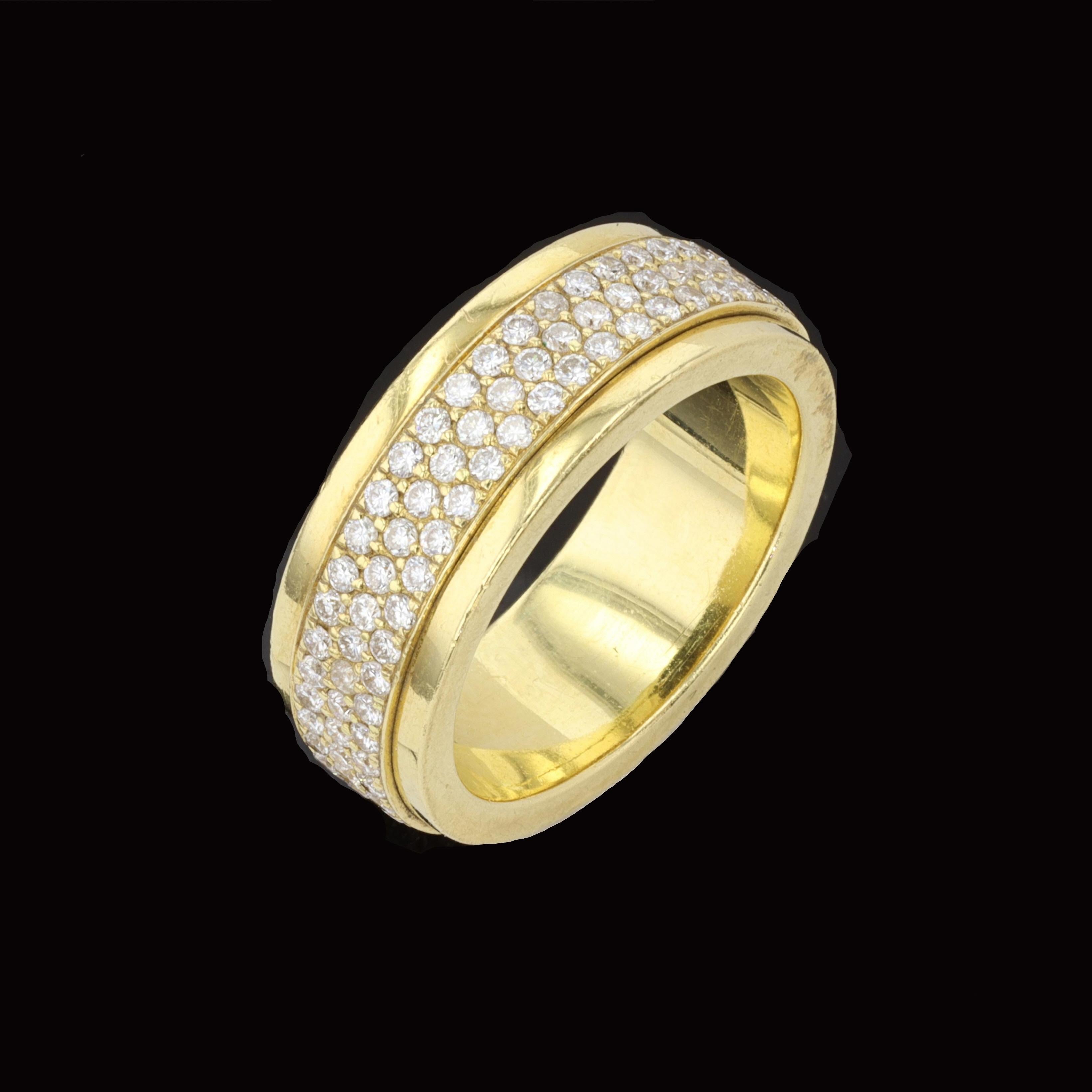 Three rows of glistening pave set round diamonds in 18K yellow gold give this estate ring an everlasting elegance. The ring is set with round cut diamonds that weigh approximately 1.50ct. The color of the diamonds is F with VS clarity. The ring