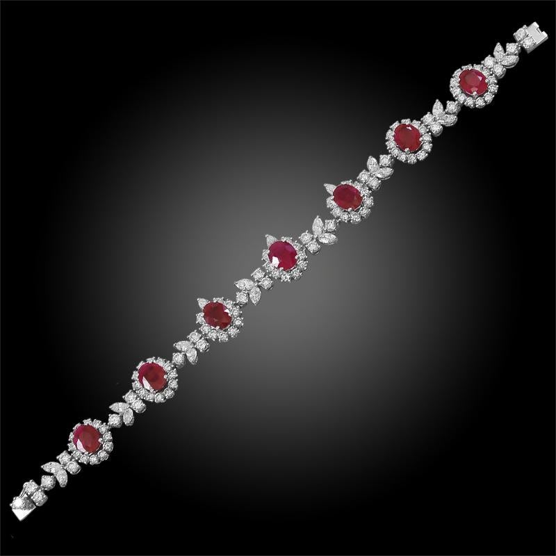 18k white gold BURMA Ruby and diamond necklace, bracelet, ear clips.

ruby approx. - 70 cts.
diamond approx. - 55 cts.
Circa - 1980s
with 3-AGL certificates
necklace 16 1/2
