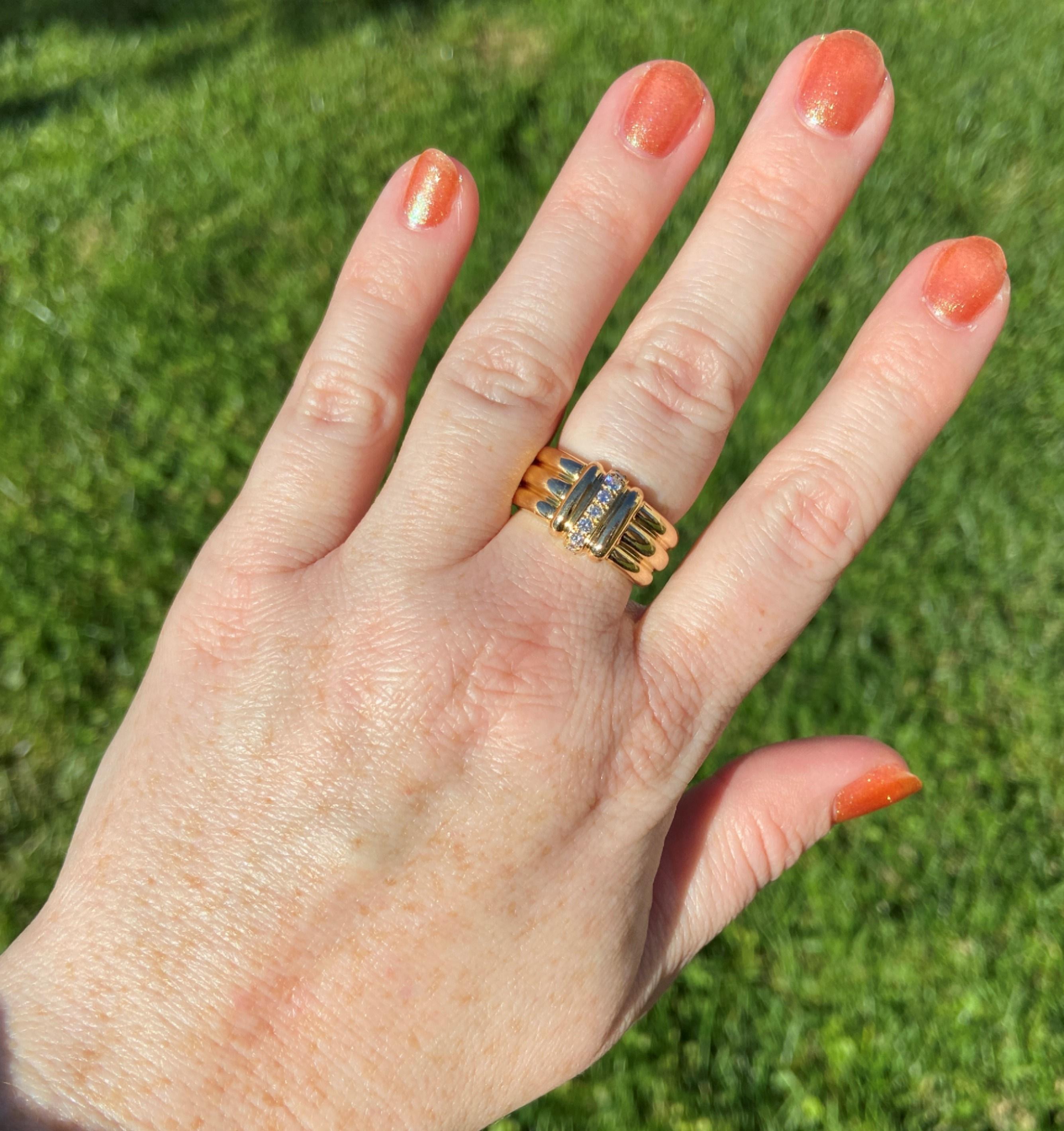 This ring features .21tcw of high quality G-H, VS1-VS2 diamonds and was made by OJ Perrin of Paris, France. The maker's mark is on the inside of the ring and the French purity mark, an eagle's head, is on the outside of the back of the band.

The