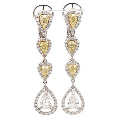 Orecchini con diamanti in oro 18K con taglio rotondo e pera