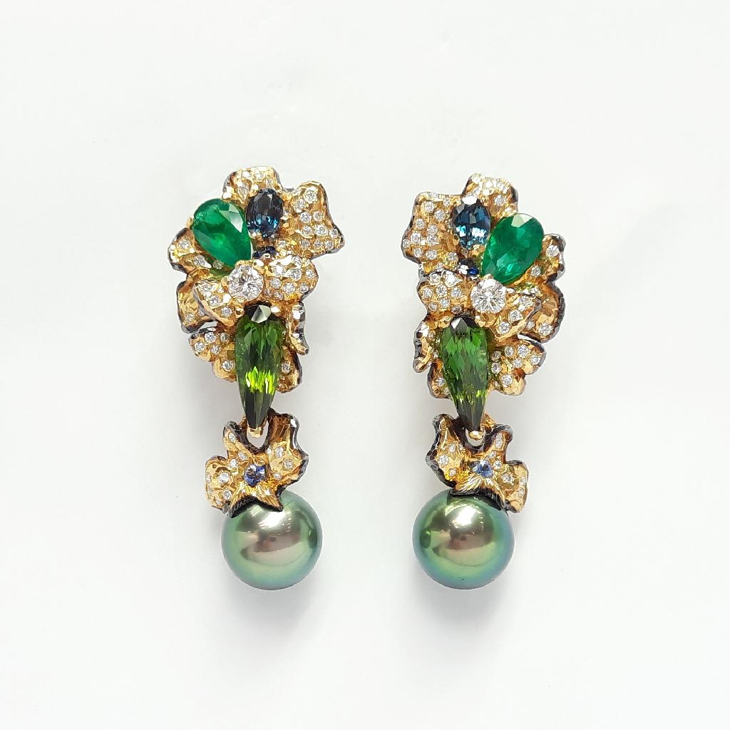 Each creation from MOISEIKIN®  is unique, colourful, inspirational and mysterious. We breathe life into metals and natural stones to make your eternal friends.

This rich in green cocktail earrings are inspired by rainbow colour iris flowers which