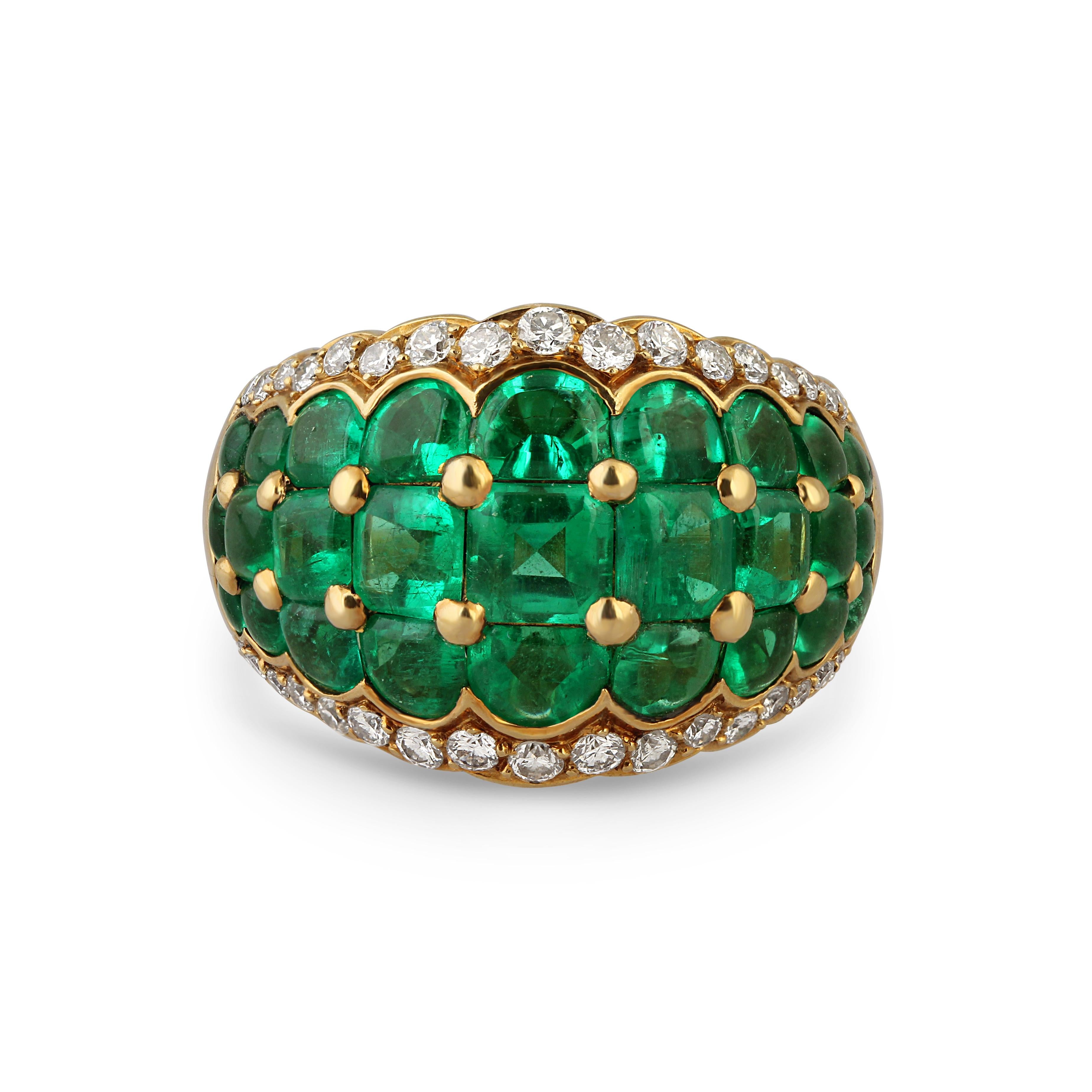 An 18k gold diamond and emerald ring, apx 4.50cts of emeralds.

Size: L
Weight: 13gr
Origin: French
