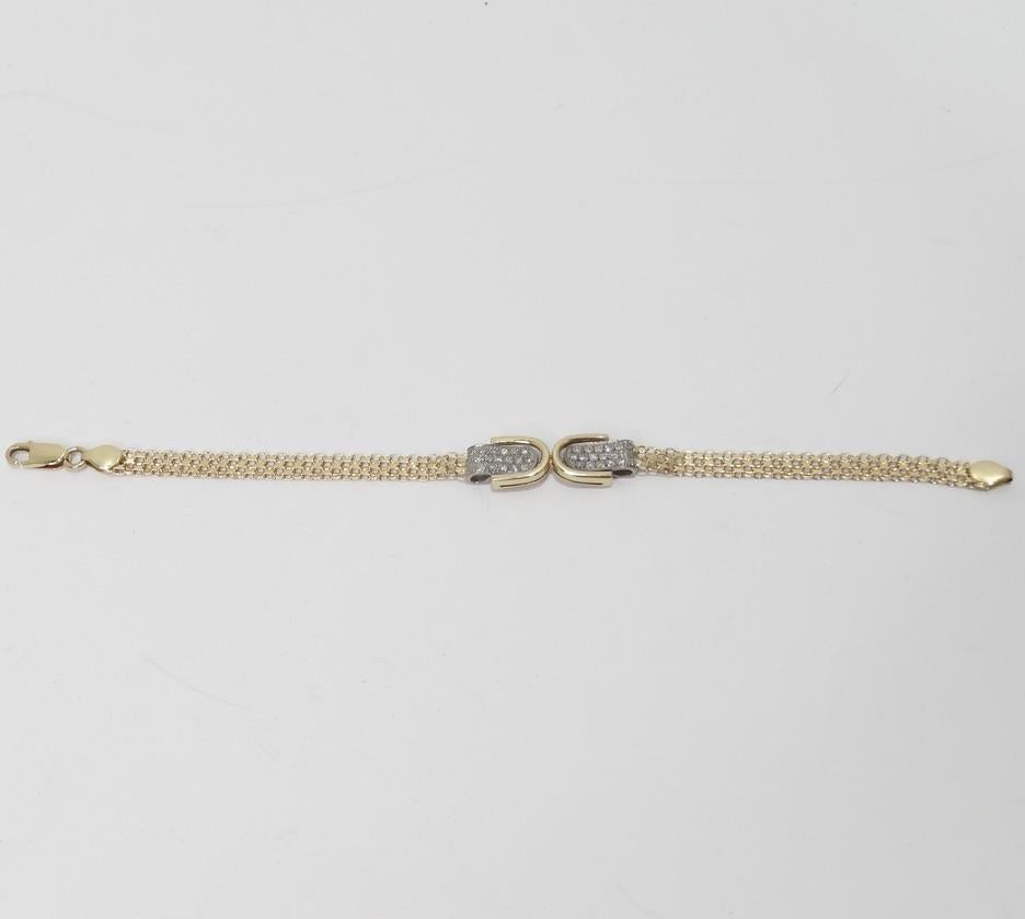 Dazzling custom made 18K yellow gold diamond encrusted bracelet featuring 36 diamonds in a horse shoe shape at the center. Custom made in Italy in 1970. This piece is so classic and versatile, stack it with your go to gold Cartier bracelets or match