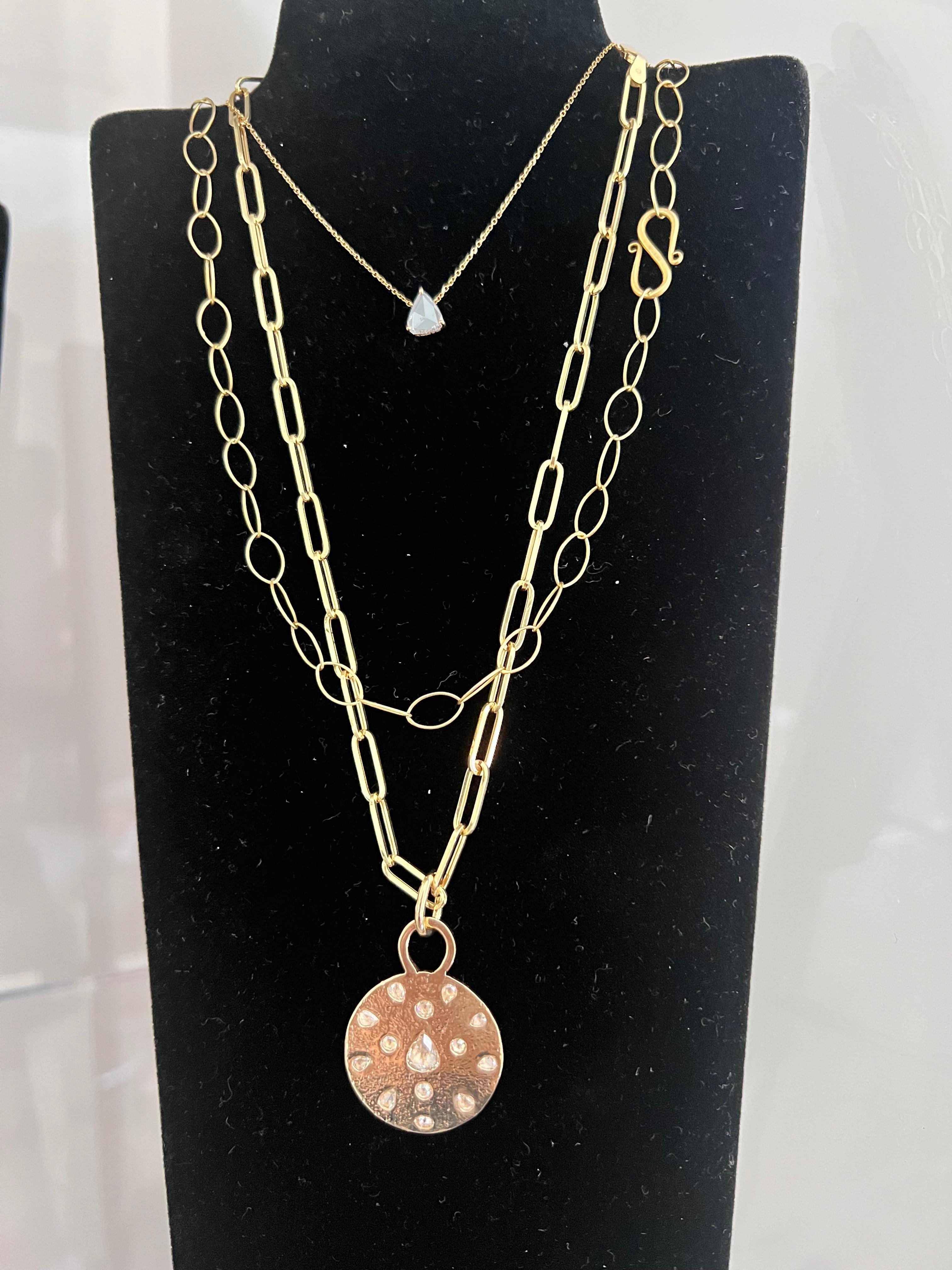 One only, totally handmade, solid gold Mandala necklace in solid 18k yellow gold. Heavy, very substantial. With over 3.5 CT’s of rose cut genuine VS1 diamonds. Comes with a 18” handmade chain in 18k as well. Or purchase just the Mandala. Infused