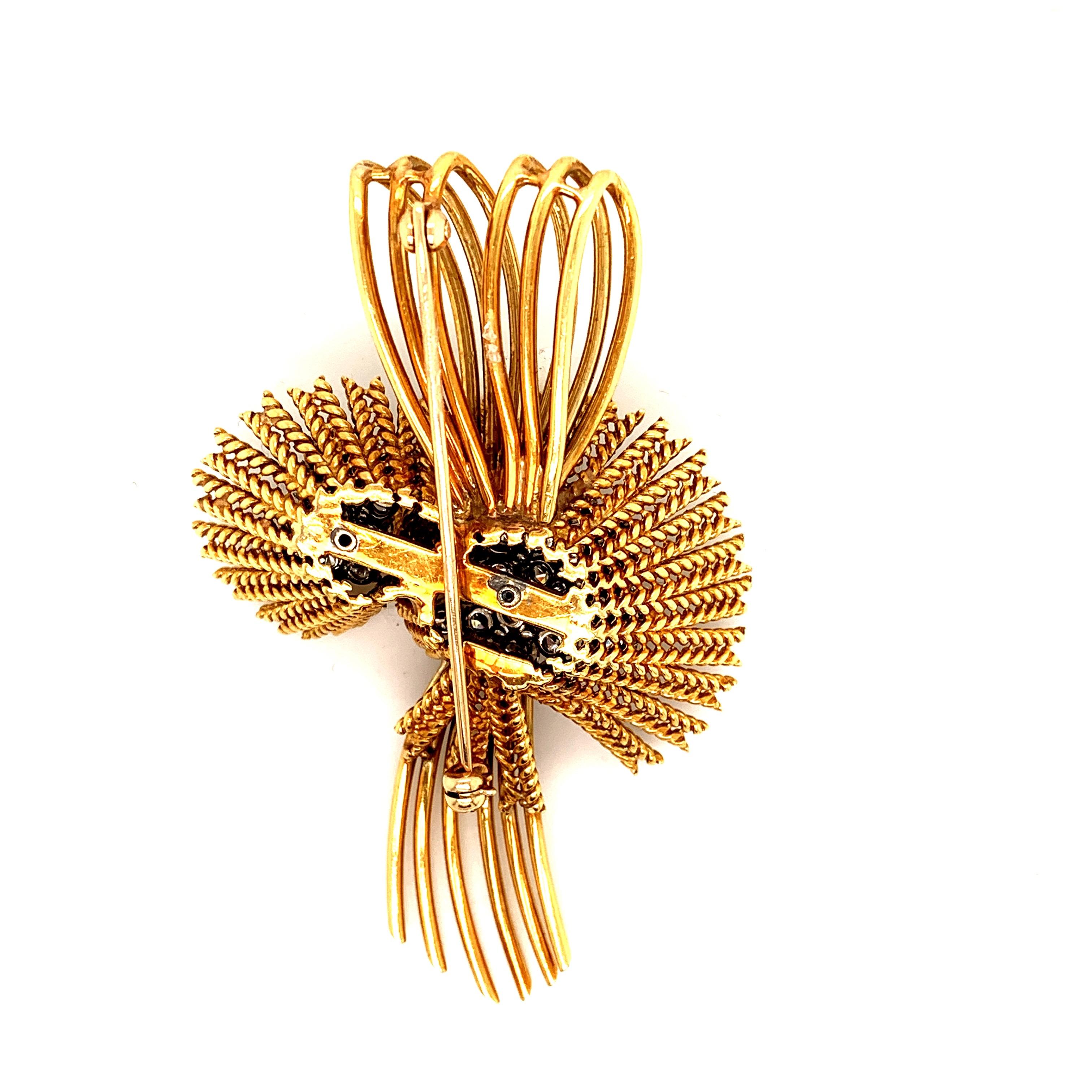 Stunning flower brooch pin, in 18k Gold set with approx. 5 carats of beautiful near colorless Diamonds.
This retro pin weighing over 35 grams of Gold captures the glamour of the 1950’s.

Viewings available in our NYC wholesale office by