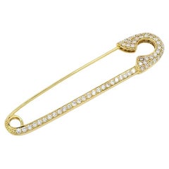Broche imperdible de oro de 18 quilates con diamantes