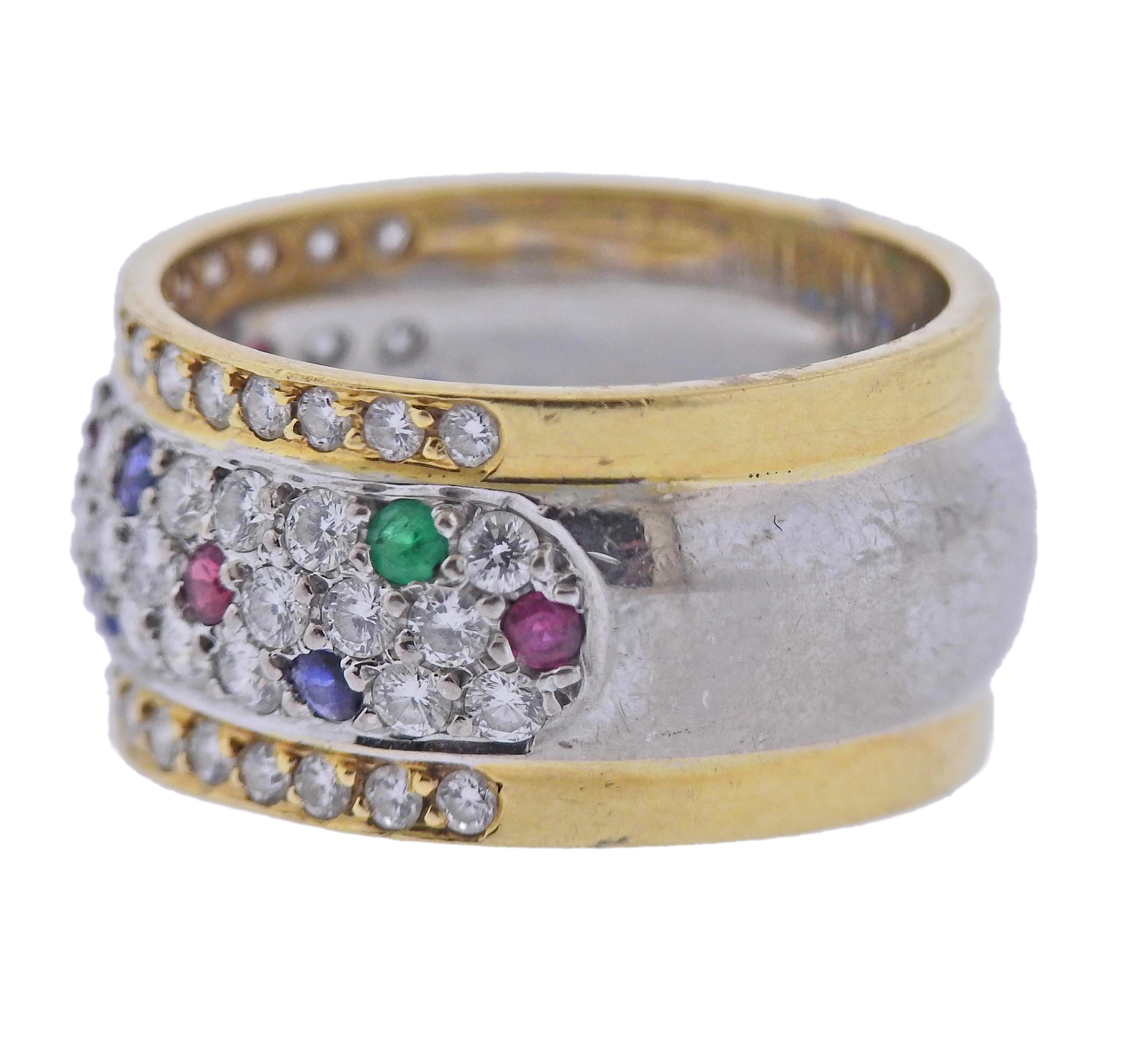 18k gold ring with Diamonds 1.44ctw, Ruby 0.13ctw,  Sapphire 0.18ctw, Emerald 0.11ctw. Ring size 9.25 (EU 60) and is 12mm wide. Marked: 50, D1.44, Em011, R013, S018 Weight - 11.4 grams.