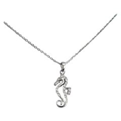 Collier à breloque cheval de plage en or 18 carats et diamants - Bijoux nautiques