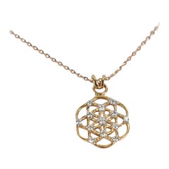 Collier fleur de vie en or 18 carats et diamants