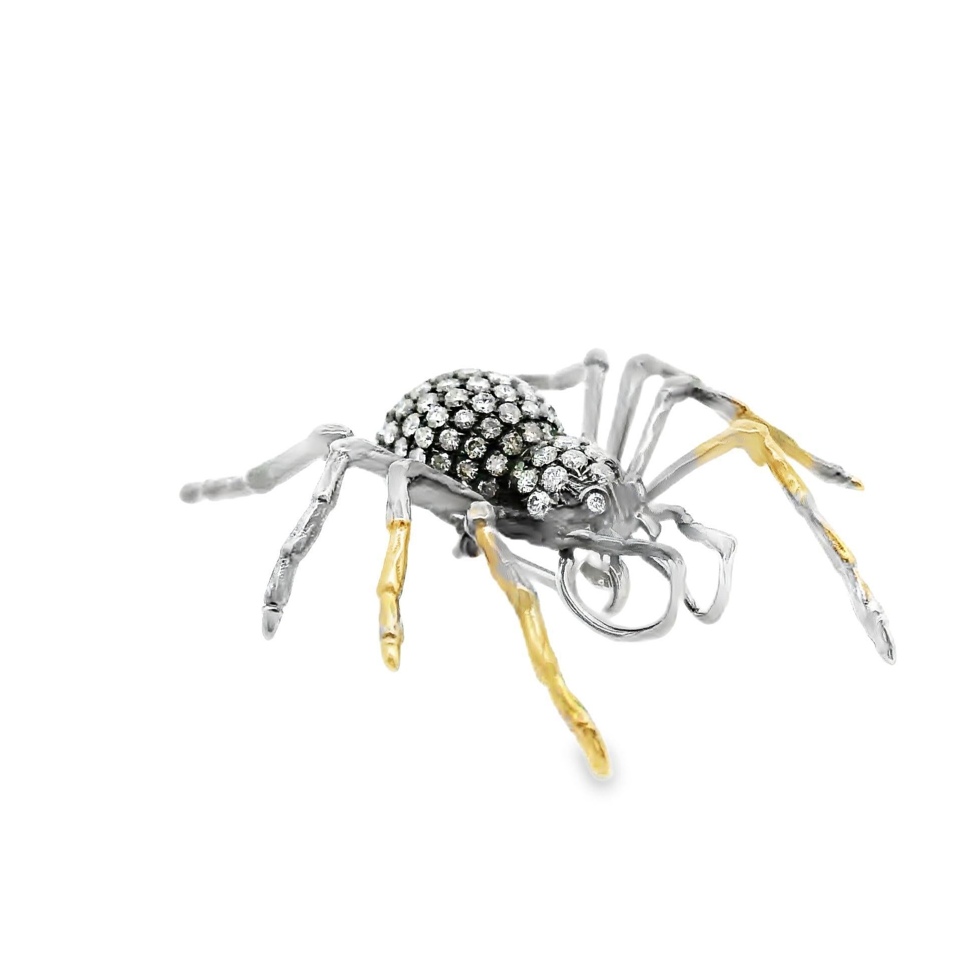 A fine and detailed brooch that doubles as a pendant! It is a diamond encrusted spider with 0.75 carats of round brilliant-cut diamonds. The spider is made in 18k gold which has been rhodium plated to give it a black metallic look that brings life