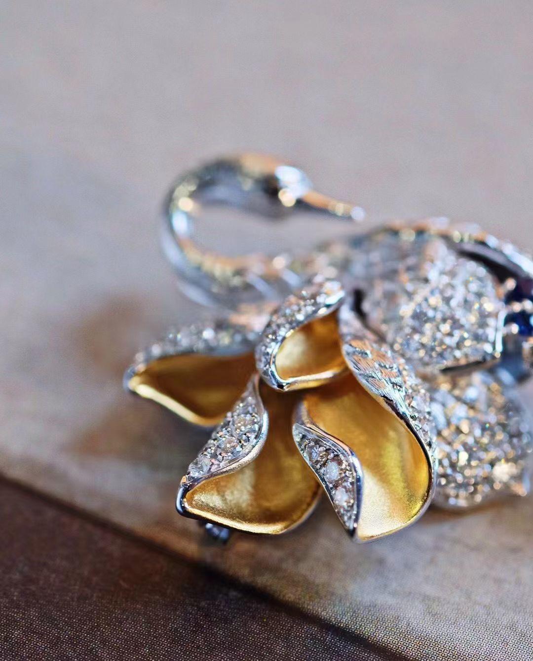 Modern 18K Gold Diamond Swan Brooch/Pendant with Yellow Sapphire and Blue Sapphire For Sale