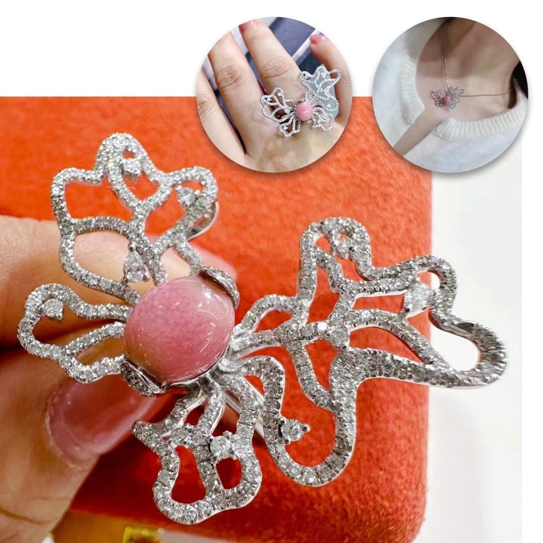 Als anmutige Komposition aus skulpturalen Kurven und strahlenden Linien fängt dieses wandelbare Schmuckstück die Bewegung eines Bogens im Flug ein.
Verankert durch eine 2,3-karätige flamingorosa Muschelperle mit weicher, symmetrischer Tropfenform