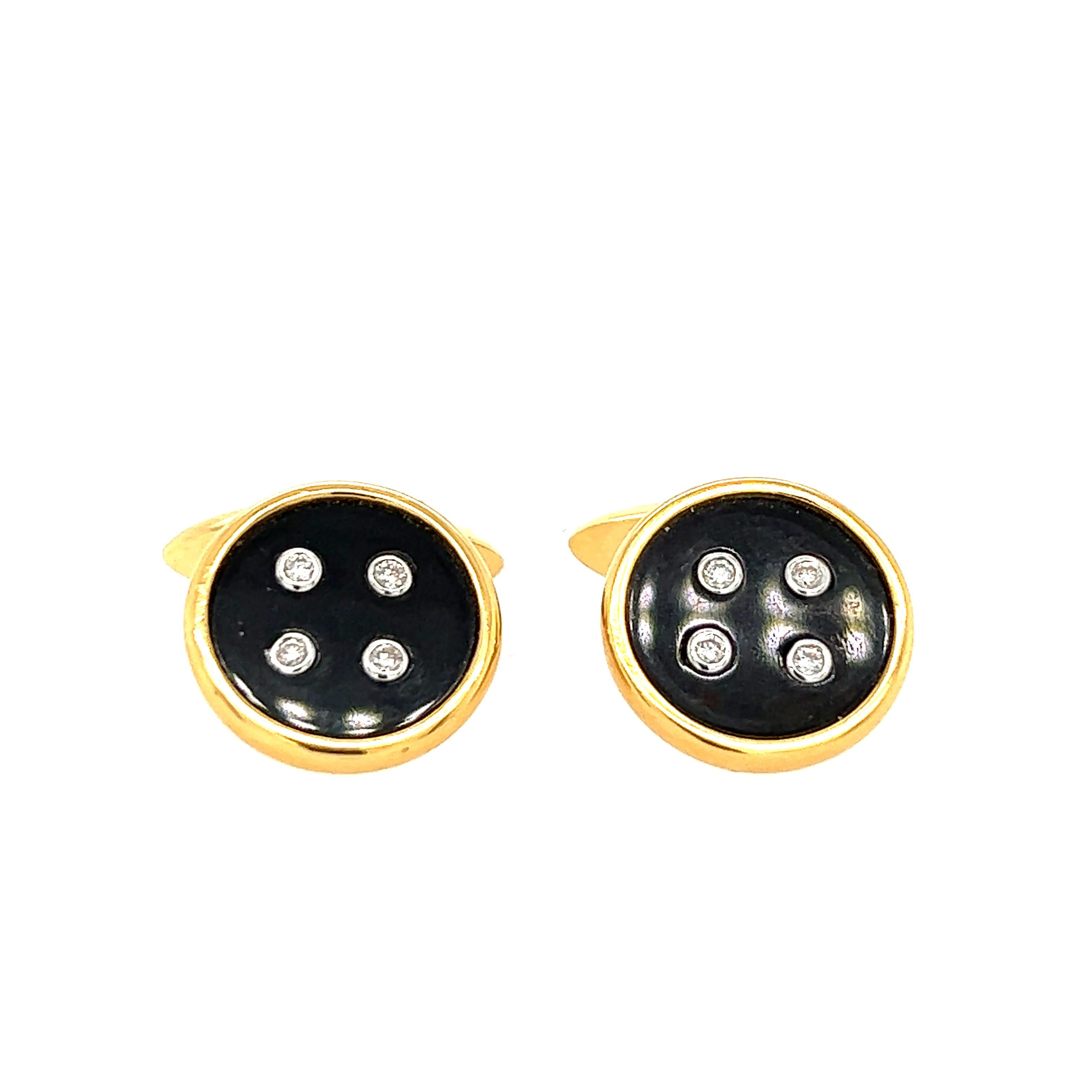 Cufflink with Onyx and Diamonds. Only 1 Pair. 

8 DIAMONDS - 0.16 CT
2 ONYX - 6.12 CT
18K Yellow Gold  -  13.88 GM 

Onyx is a stone that offers up powerful vibrations of protection, strength, focus, and willpower. This stone is here to continuously