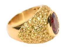 18 Karat Gold Dome Ring with Oval Pink Tourmaline and Pave Yellow Sapphires
