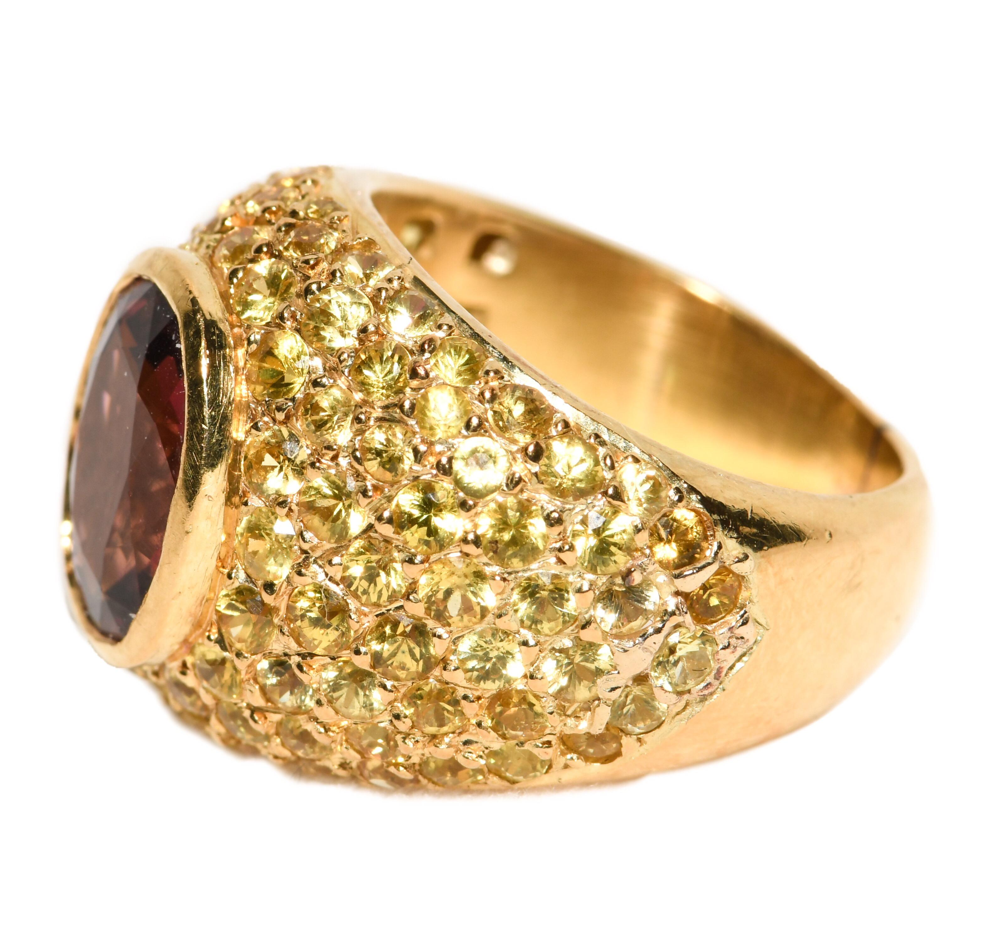 Modern 18 Karat Gold Dome Ring with Oval Pink Tourmaline and Pave Yellow Sapphires For Sale