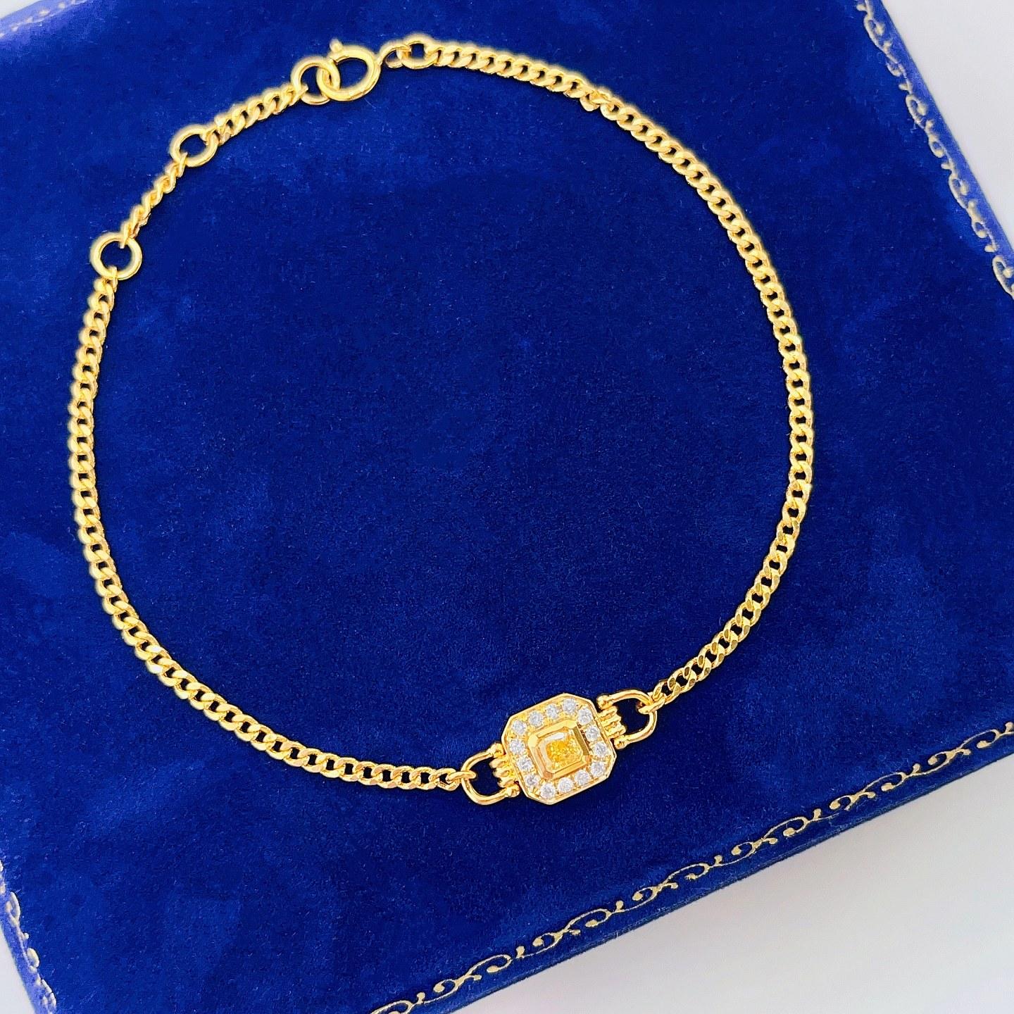 18 Karat Gold Doppelverschluss-Armband mit gelbem Diamanten im Kissenschliff Damen im Angebot