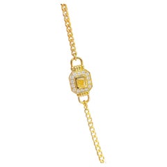 Bracciale a doppia chiusura in oro 18k con diamante giallo taglio cuscino
