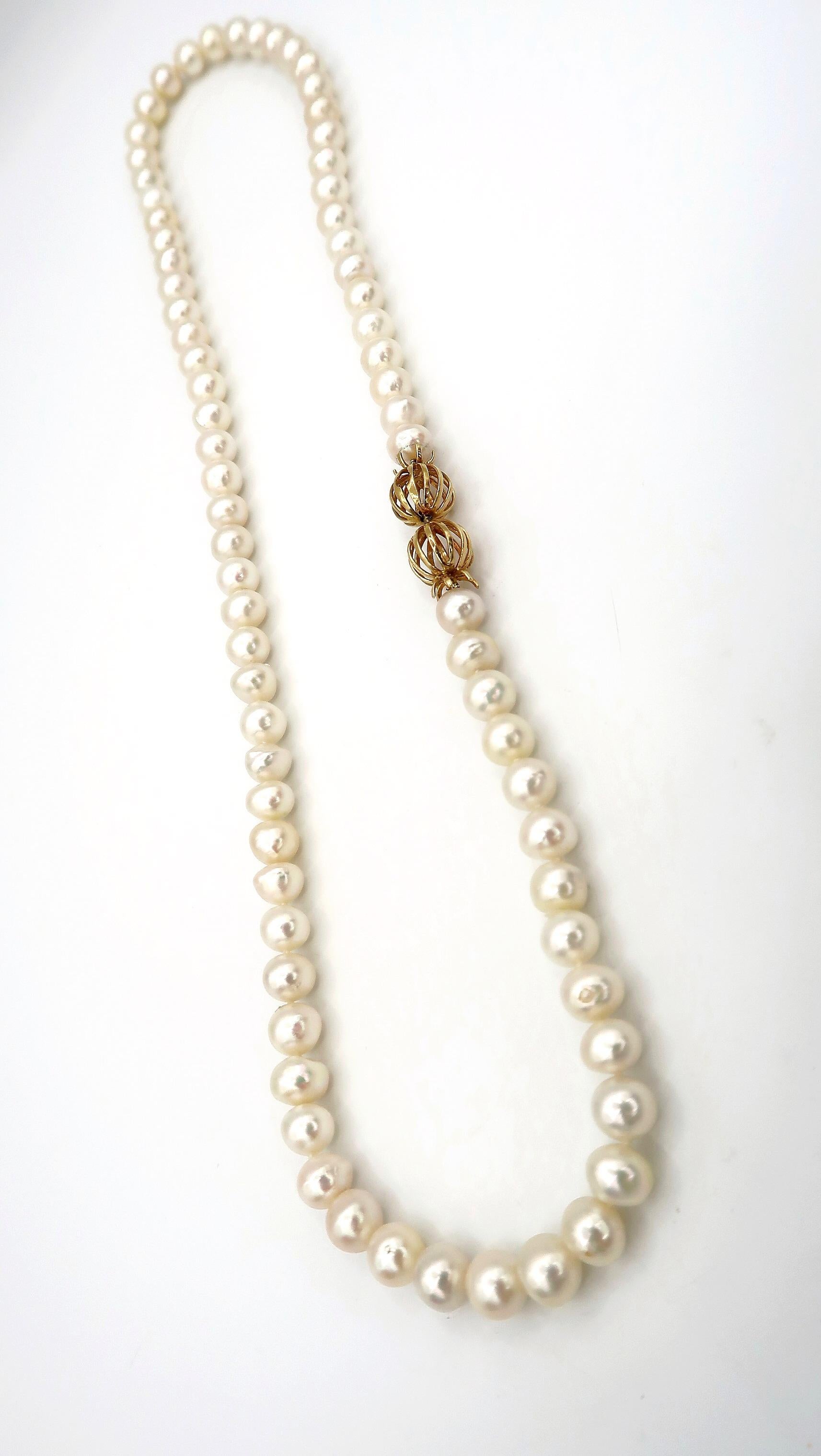 long single strand pearl necklace