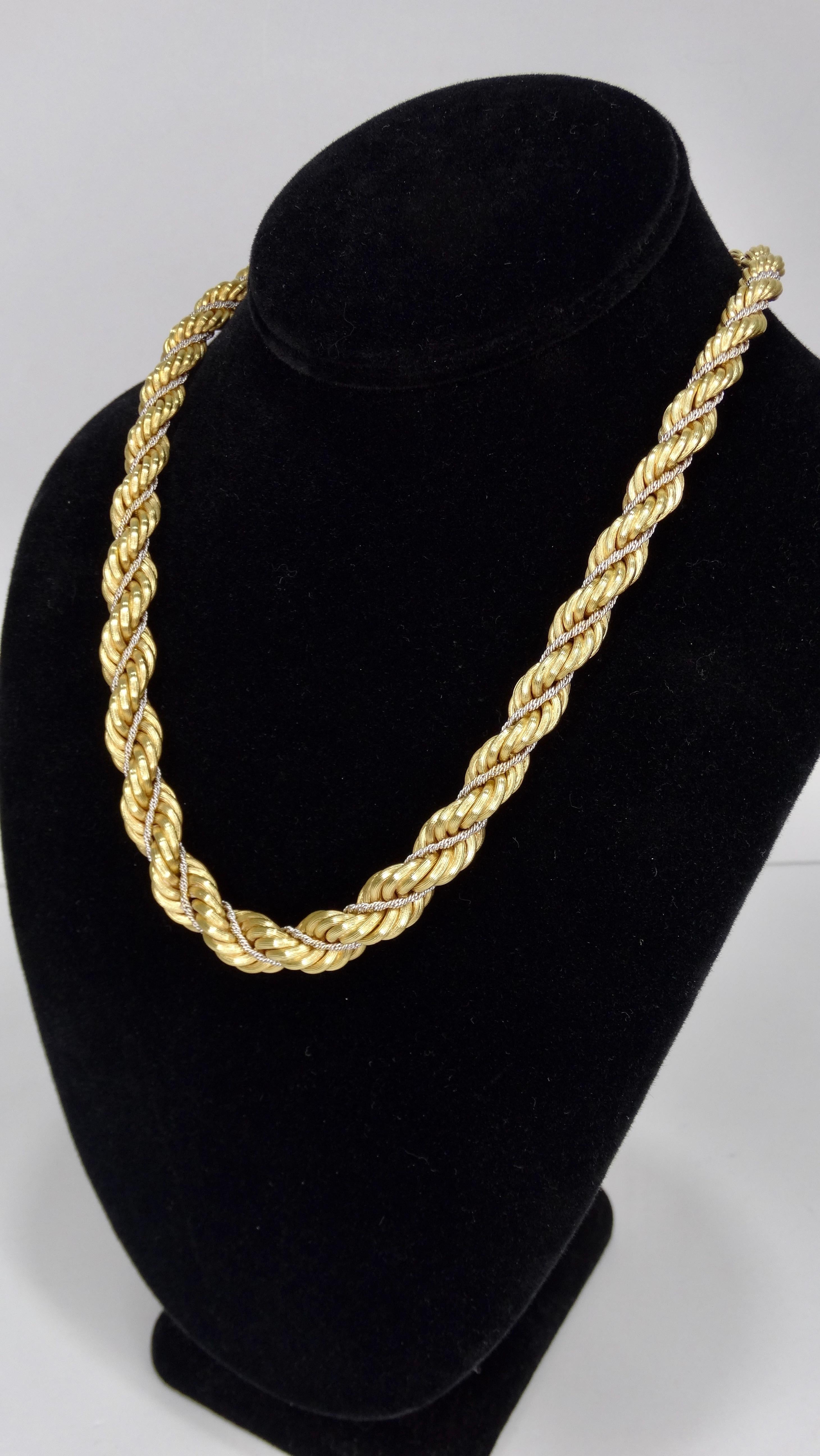 Top Favorite of ours... this Beautiful 18k Gold necklace featuring a double gold rope twist design and a single 14k white gold, Stamped 750 and 166VI. Total weight 62.77g. Perfect to layer with your favorite cuban link gold chains or wear alone!